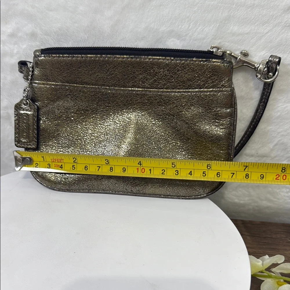 Coach Gold Clutch Wristlet with Elegant Design